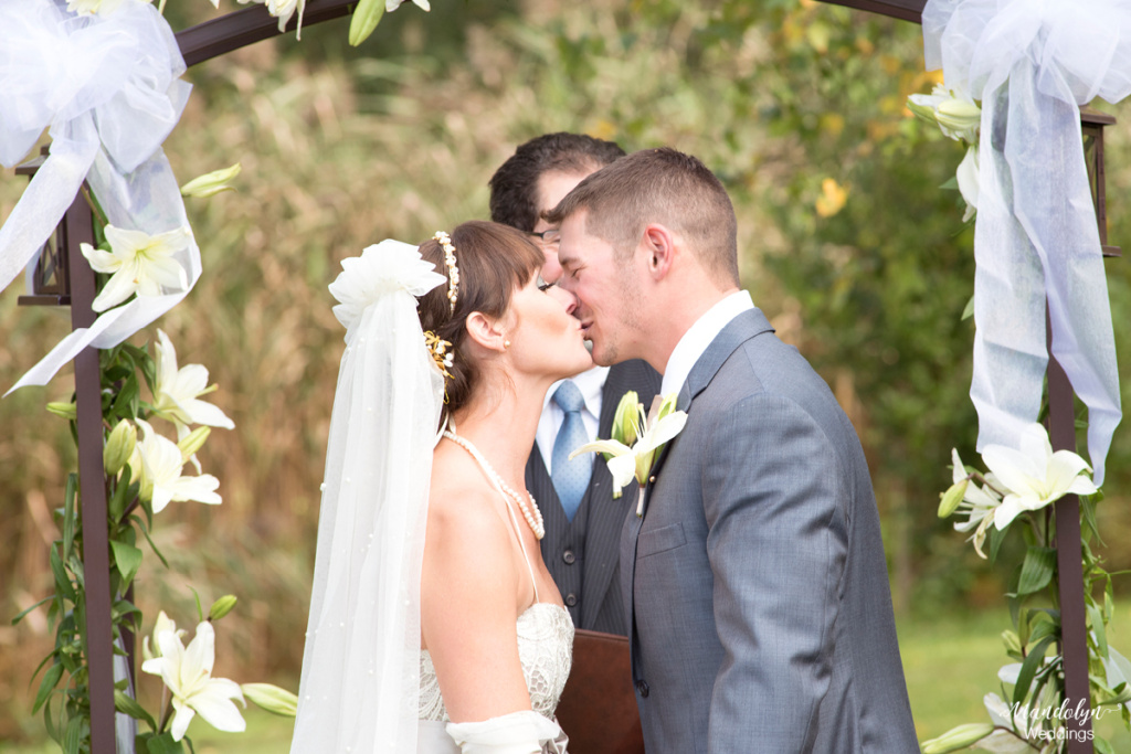 Bride and groom first kiss as husband and wife. 