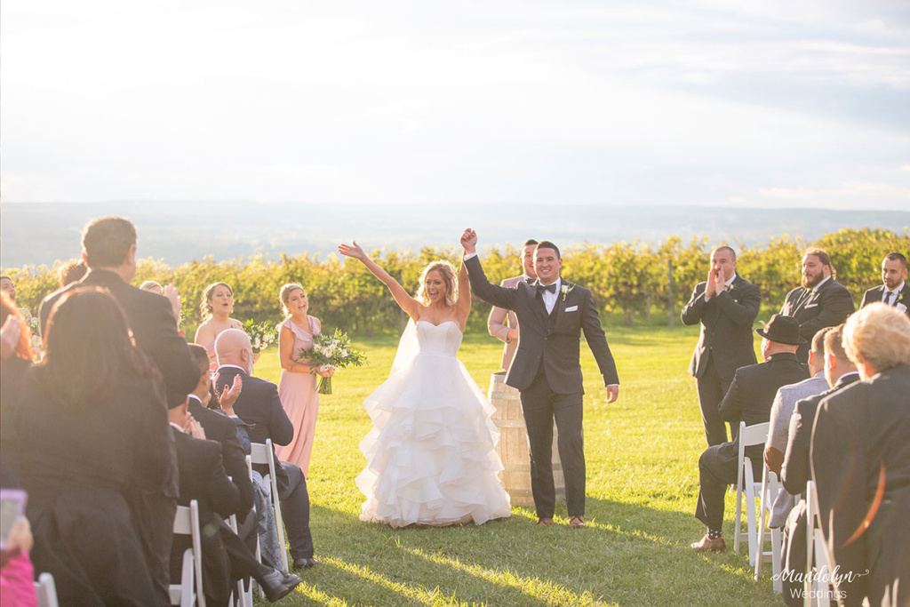Bride and groom celebrate after saying "I do."